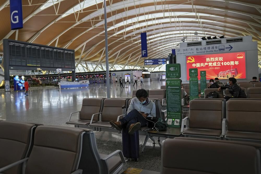 Passengers at Pudong International Airport in Shanghai